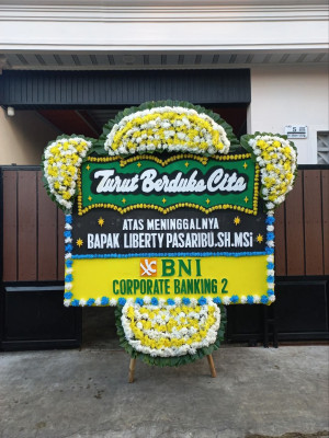 Papan Bunga Duka di Mancani
