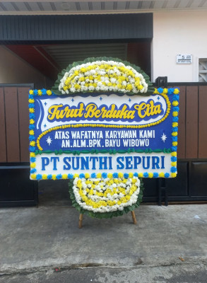 Papan Bunga Duka di Mancani
