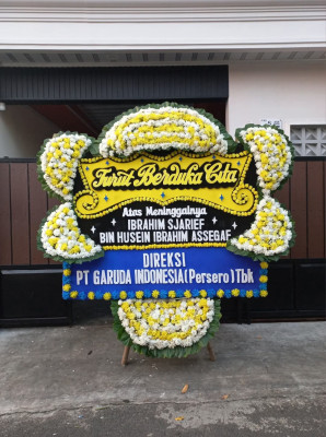 Papan Bunga Duka di Mancani