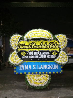 Papan Bunga Duka di Mancani