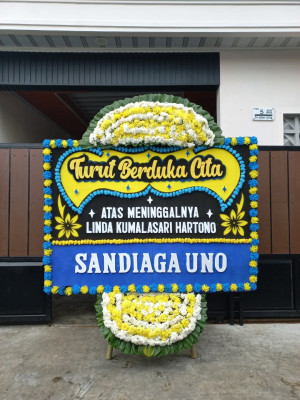 Papan Bunga Duka di Mancani