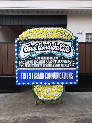 Papan Bunga Duka di Mancani